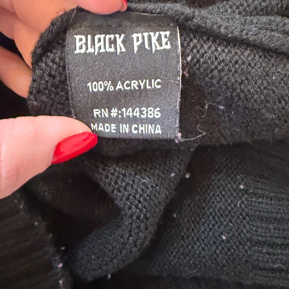 Black Pike streetwear sweater with bear graphic wearing a 